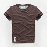 Wiaofellas  -  Retro Distressed Cotton round Neck Short Sleeve T-Shirt Loose Fit Basic Color Summer Youth Fashion Standard Tailoring Male Top