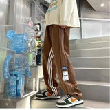 WIAOFELLAS  -  Spring Autumn Contrast Color Bloomers Trousers Pockets Elastic High Waisted Striped Men's Clothing England Style Casual Pants