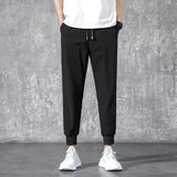Wiaofellas  -  Men Casual Pants Fitness Sportswear Tracksuit Bottoms Skinny Sweatpants Cotton Trousers Gyms Jogger Track Pants Mens Joggers