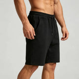Wiaofellas  -  Men Solid Drawstring Straight Sports Shorts Summer Breathable Loose Cotton Quick Dry Five Point Casual Pants Cross Border New