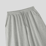 Wiaofellas  -  Men Pants Solid Color Drawstring Joggers Workout Casual Sweatpants Men Streetwear Loose Fashion Male Long Trousers