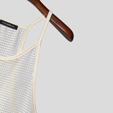 WIAOFELLAS  -  Men Tank Tops Mesh Sleeveless Hollow Out Casual Male Vests Streetwear 2025 Solid See Through Summer Sexy Men Clothing