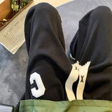 WIAOFELLAS  -  Spring Autumn Contrast Color Bloomers Trousers Pockets Elastic High Waisted Striped Men's Clothing England Style Casual Pants