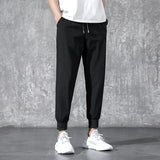 Wiaofellas  -  Men Casual Pants Fitness Sportswear Tracksuit Bottoms Skinny Sweatpants Cotton Trousers Gyms Jogger Track Pants Mens Joggers