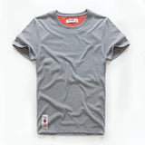 Wiaofellas  -  Retro Distressed Cotton round Neck Short Sleeve T-Shirt Loose Fit Basic Color Summer Youth Fashion Standard Tailoring Male Top