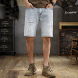 Wiaofellas  -  The new summer fashion men's washed and ground white ripped denim shorts men's slim straight casual five-point medium pants