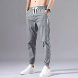 Ice Silk Pants Men's Summer Thin Section Trend Wild Loose Casual Pants Sports Pants Quick-drying Harlan Nine-point Pants